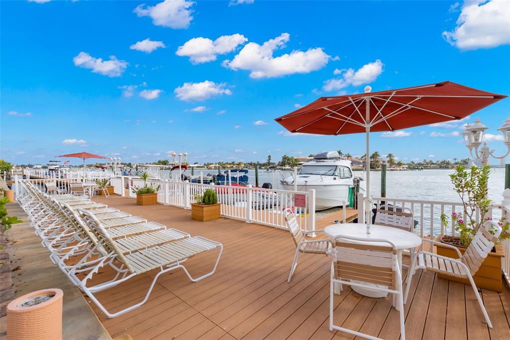 8911 Blind Pass Road, Unit 214 St. Pete Beach, FL 33706 - Photo 22 of 35 a outdoor view with a sitting space