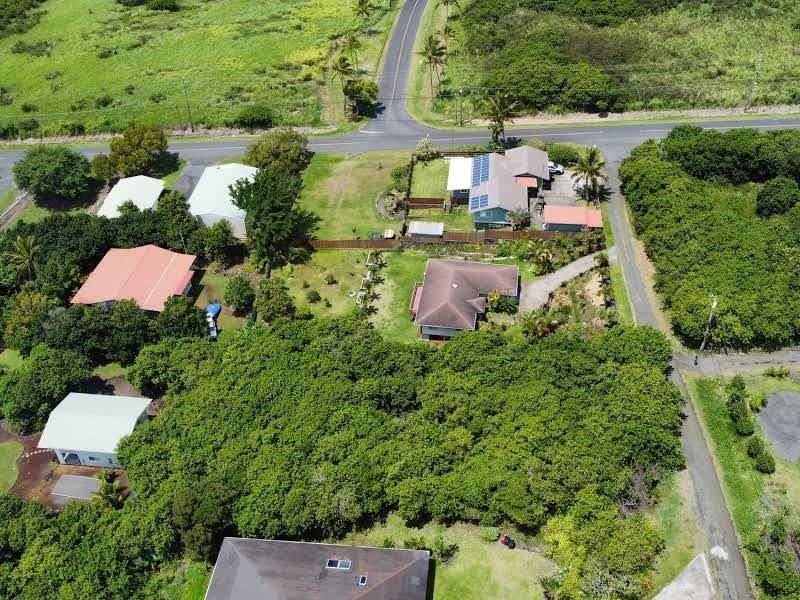 5 Kuamo'o Road Naalehu, HI 96772 - Photo 5 of 6 an aerial view of a house with a garden
