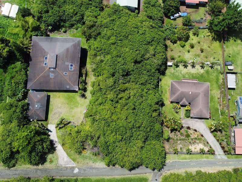 5 Kuamo'o Road Naalehu, HI 96772 - Photo 6 of 6 an aerial view of a house with a yard and garden