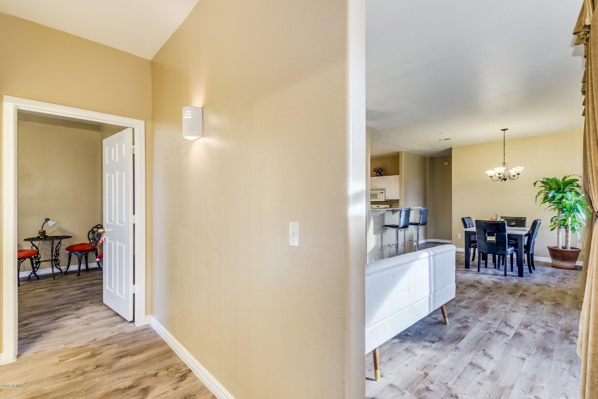 9550 East Thunderbird Road, Unit 252 Scottsdale, AZ 85260 - Photo 2 of 21 a view of a dining area with furniture