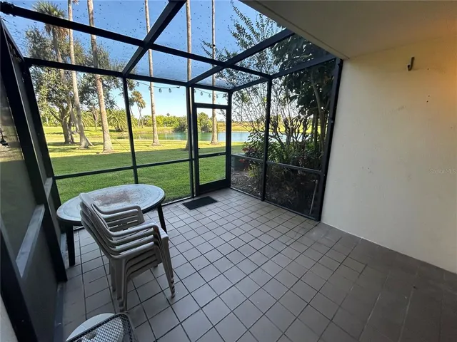 a bedroom with furniture and window