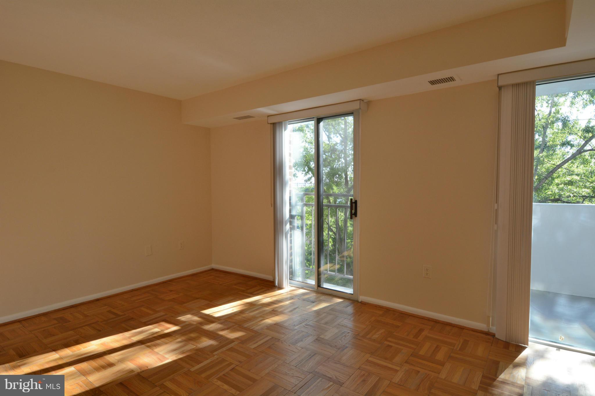 700 7th Street Southwest, Unit 630 Washington, DC 20024 - Photo 14 of 28 a view of an empty room with a window