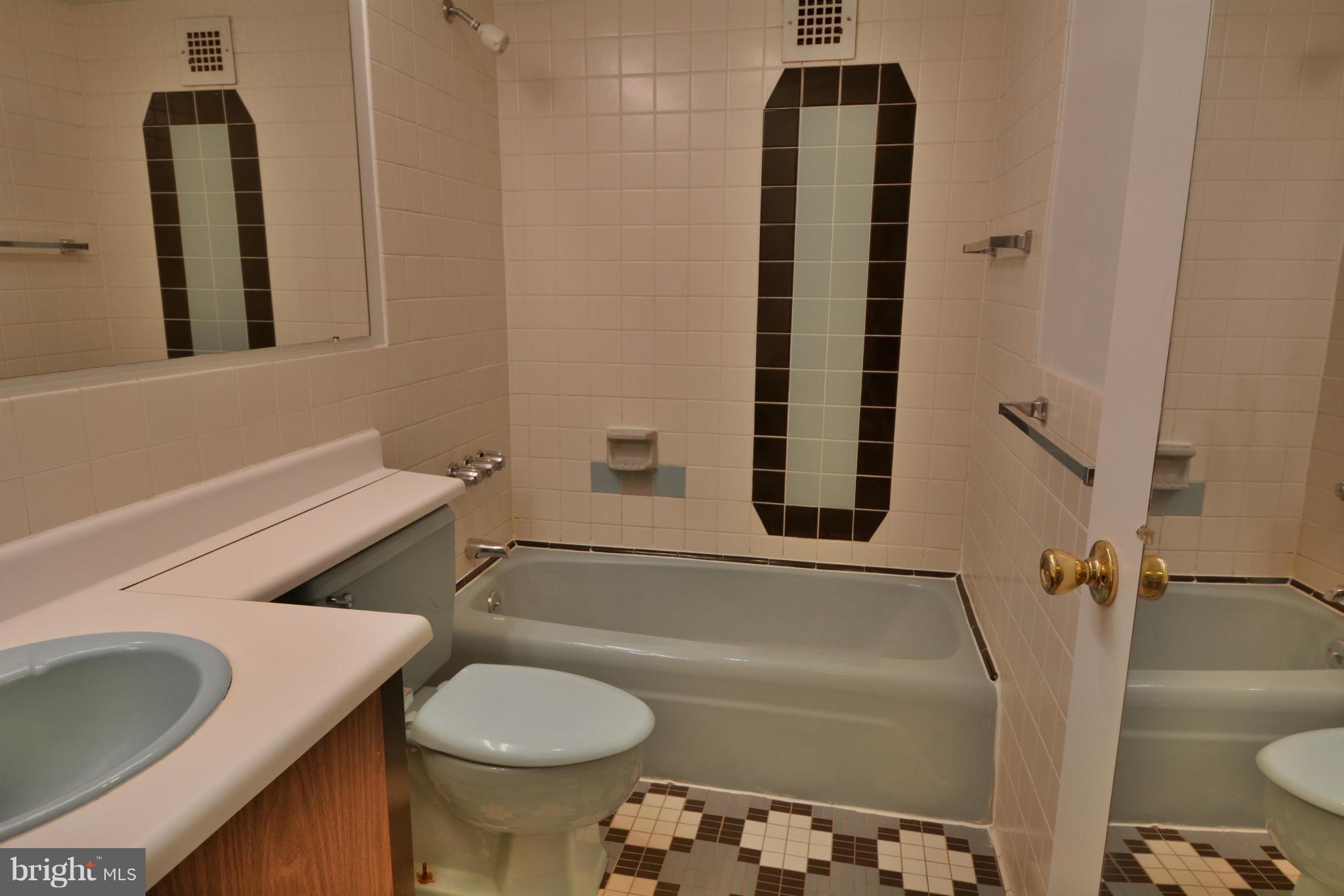 700 7th Street Southwest, Unit 630 Washington, DC 20024 - Photo 17 of 28 a bathroom with a sink toilet and shower
