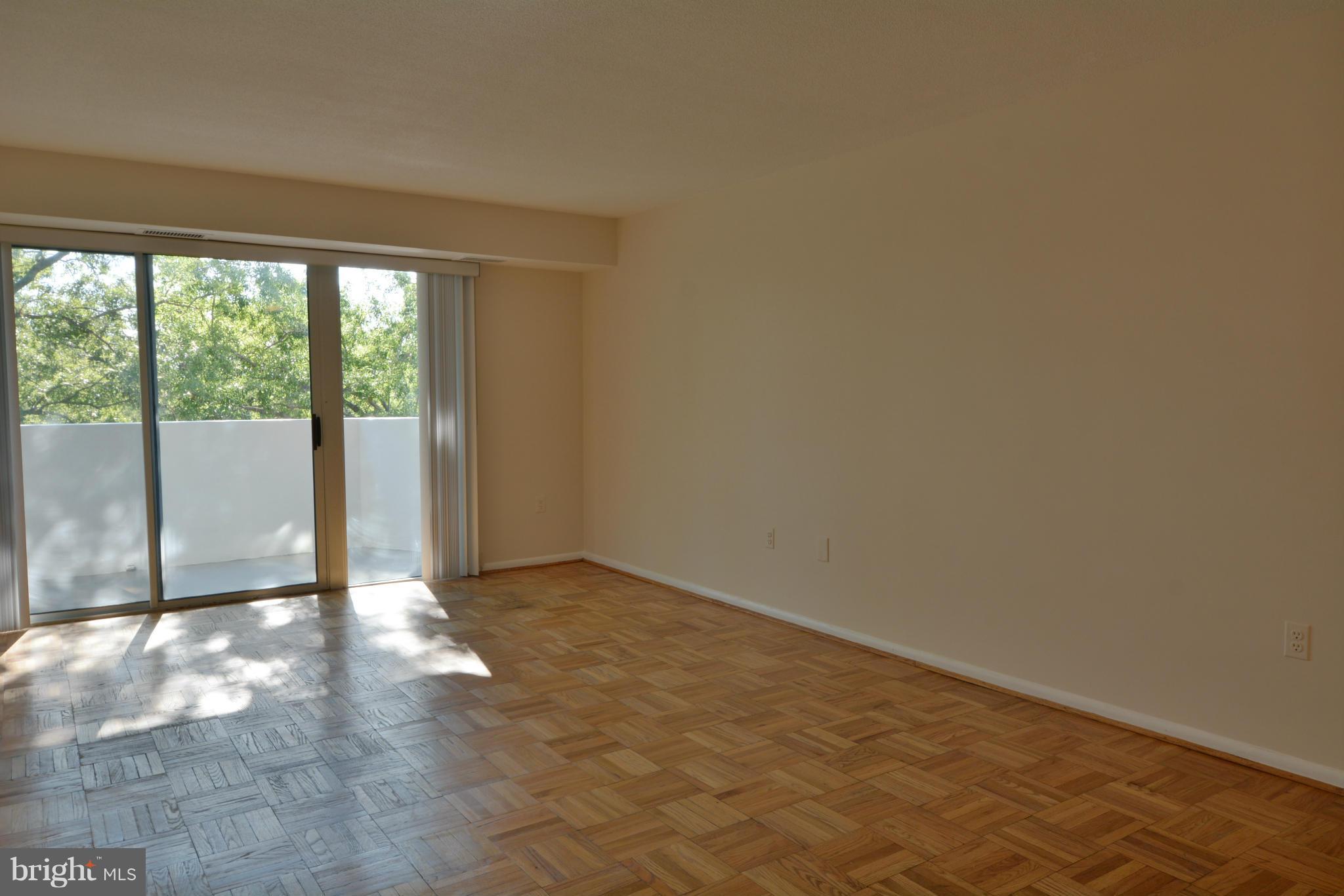 700 7th Street Southwest, Unit 630 Washington, DC 20024 - Photo 5 of 28 a view of a room with sliding glass door