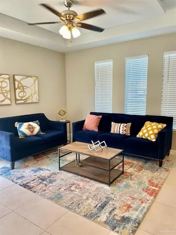 a living room with furniture and a couch