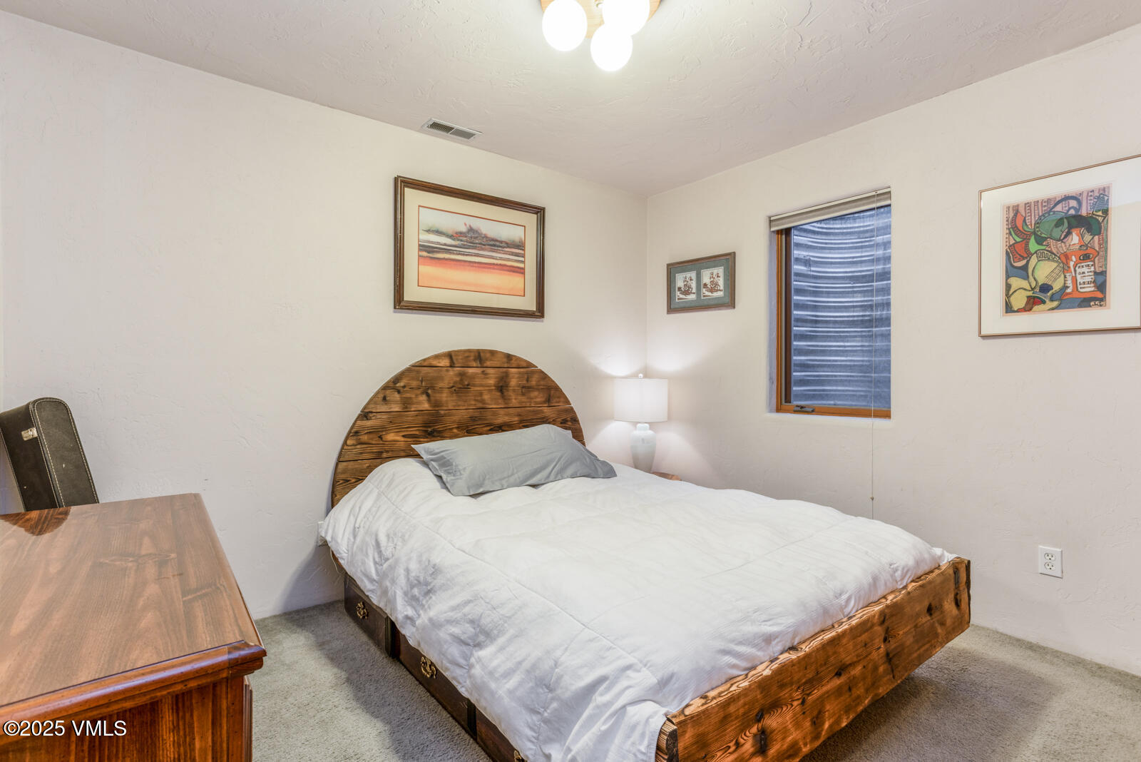 20 Hereford Road Edwards, CO 81632 - Photo 25 of 32 a bedroom with bed and a window