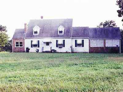 2301 Grubby Road Blackstone, VA 23824 - Photo 1 of 1 a view of a house with a backyard space