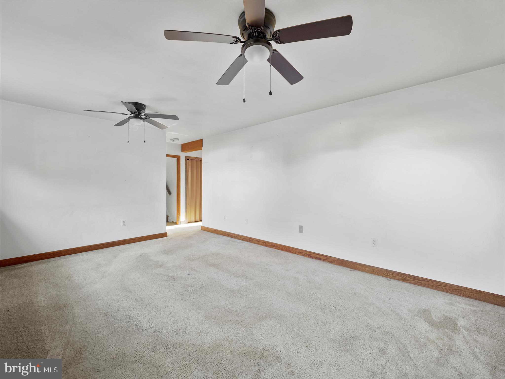 104 Rebecca's Court Smithsburg, MD 21783 - Photo 25 of 34 wooden floor in an empty room