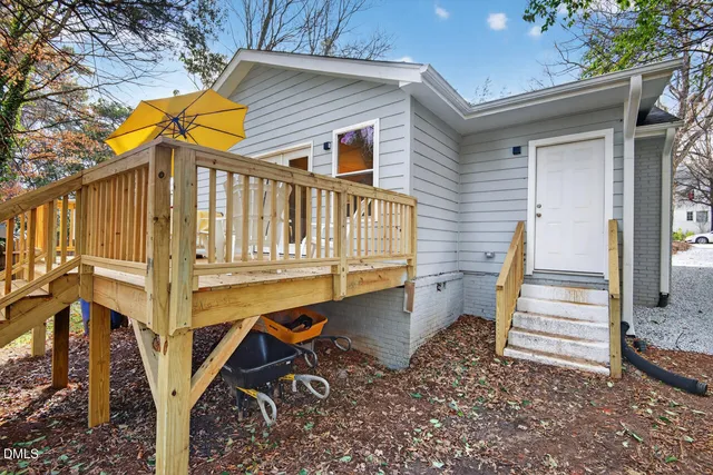 a view of outdoor space with deck and backyard