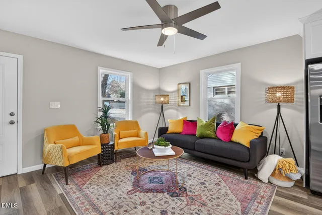 a living room with furniture and a couch