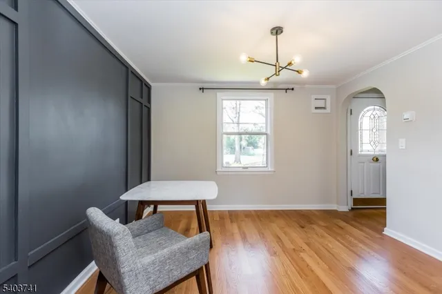a view of a room with furniture window and wooden floor