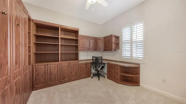 a room that has a dresser and a chair in it