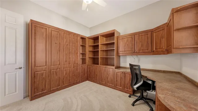 a view of a workspace with furniture