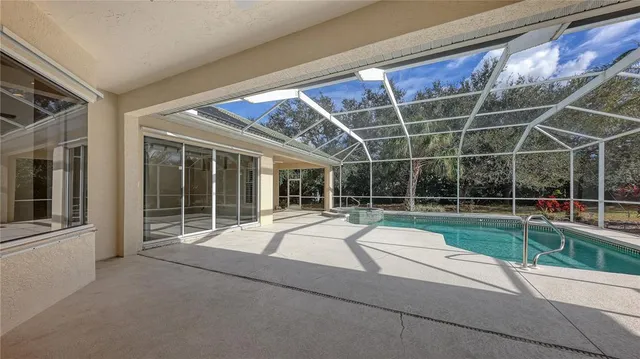 a swimming pool with garden view
