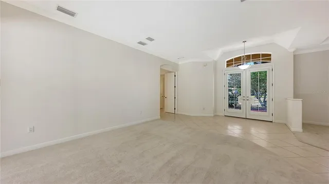 an empty room with windows