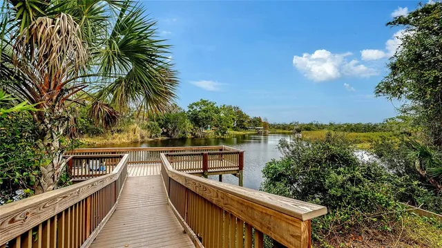 a view of a balcony with chairs