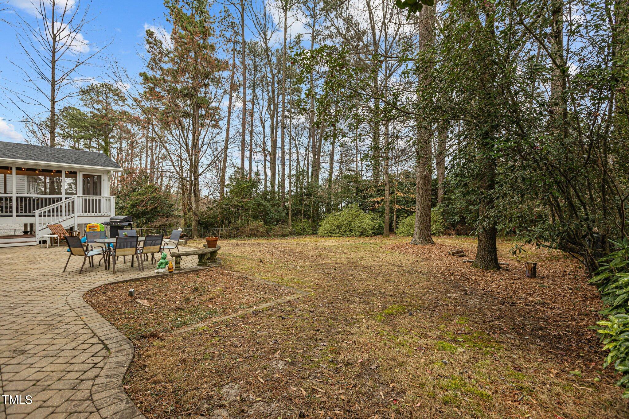 7612 Harps Mill Road Raleigh, NC 27615 - Photo 40 of 49 a view of outdoor space with seating