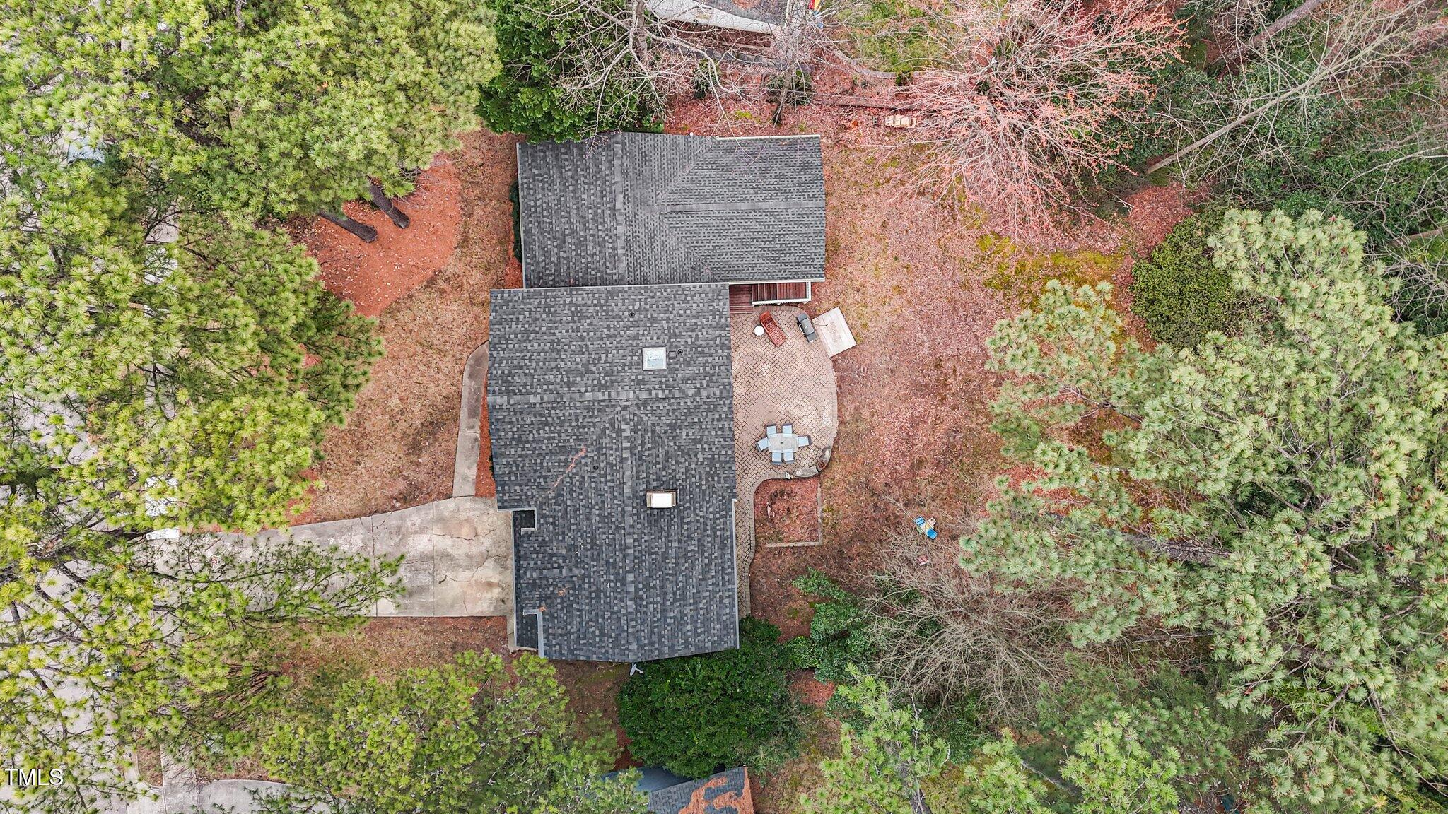 7612 Harps Mill Road Raleigh, NC 27615 - Photo 42 of 49 an aerial view of residential house with outdoor space and trees all around