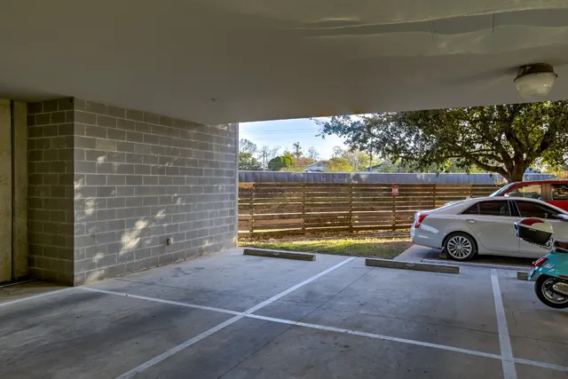 a view of a car parked in a parking lot