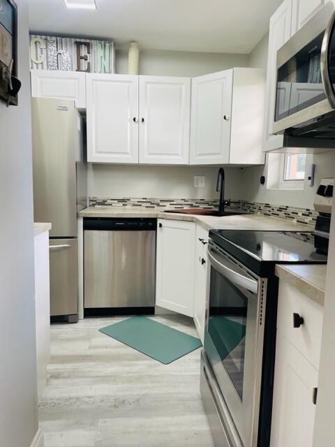 1921 Southwest Palm City Road, Unit A Stuart, FL 34994 - Photo 6 of 33 IMG_9782