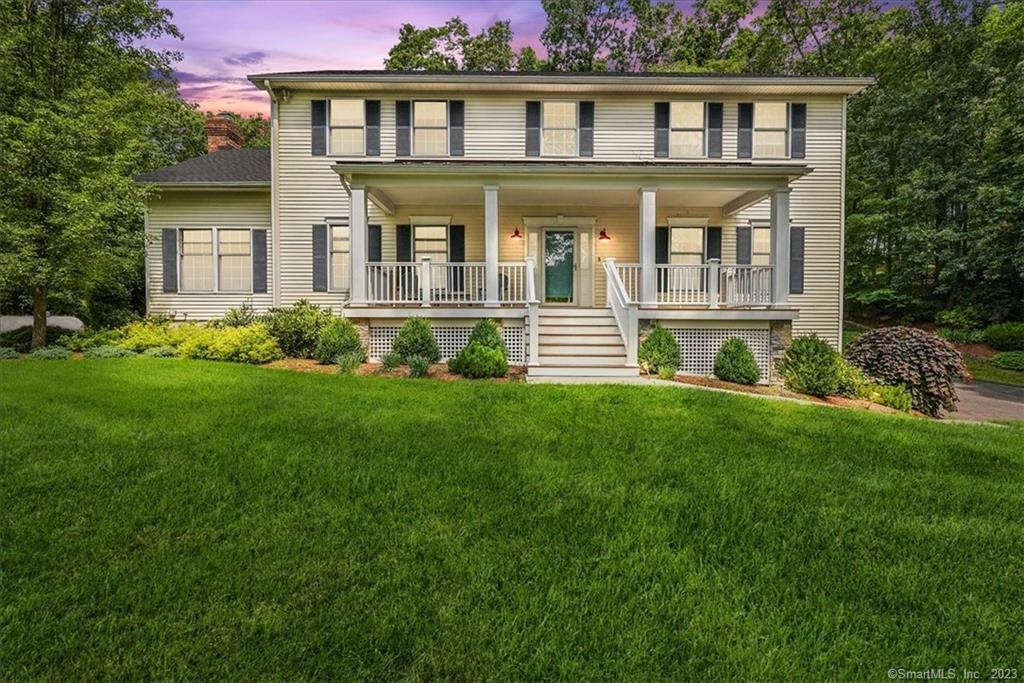 34 A Obtuse Road South Brookfield, CT 06804 - Photo 1 of 1 a front view of a house with a yard