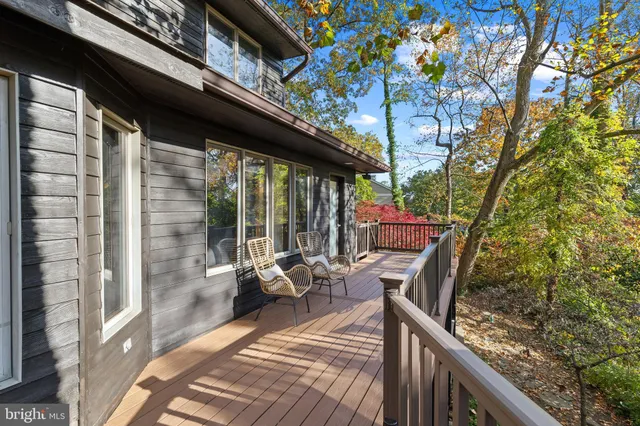 a view of balcony with furniture