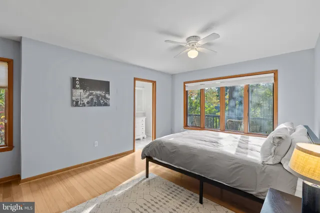a kitchen that has a stove and a table in it