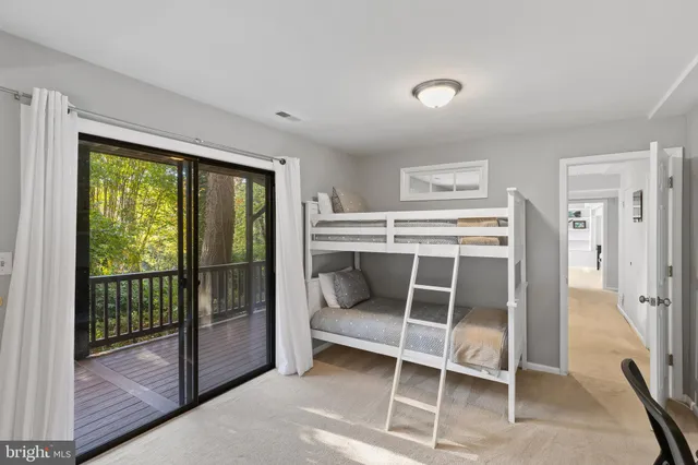 a view of a workspace with furniture