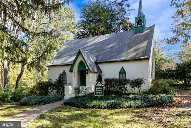 a view of a lake with a house