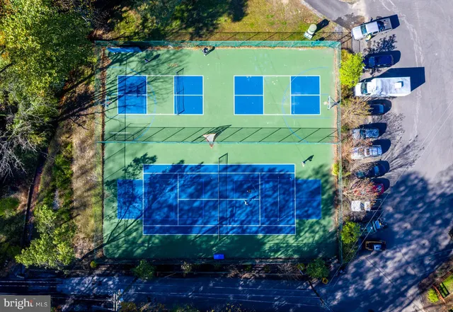 a view of a couches and table in a terrace
