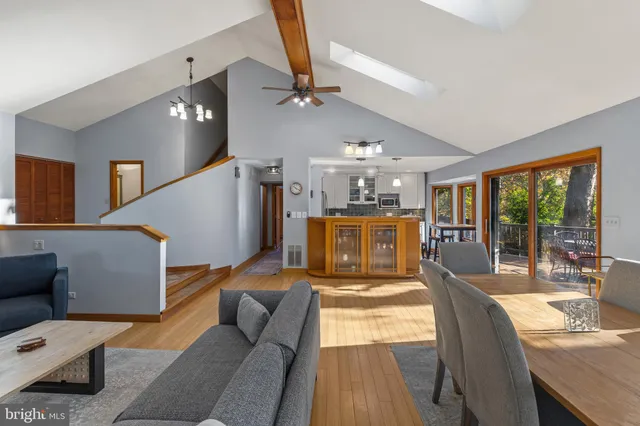 a view of a lake with houses in the back