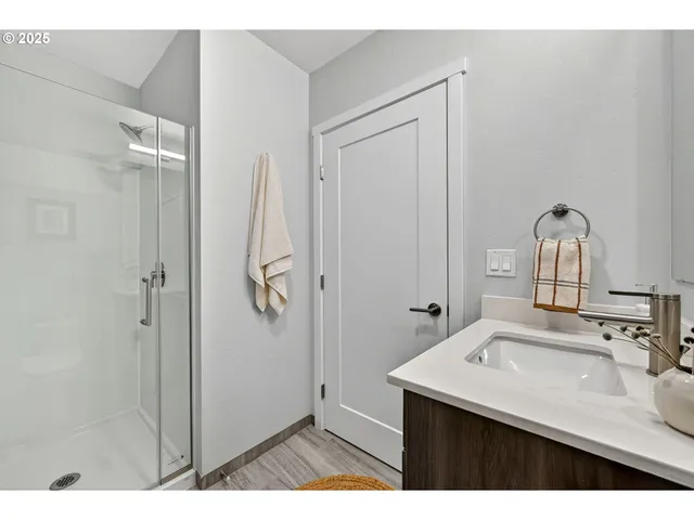 a bathroom with a sink and mirror