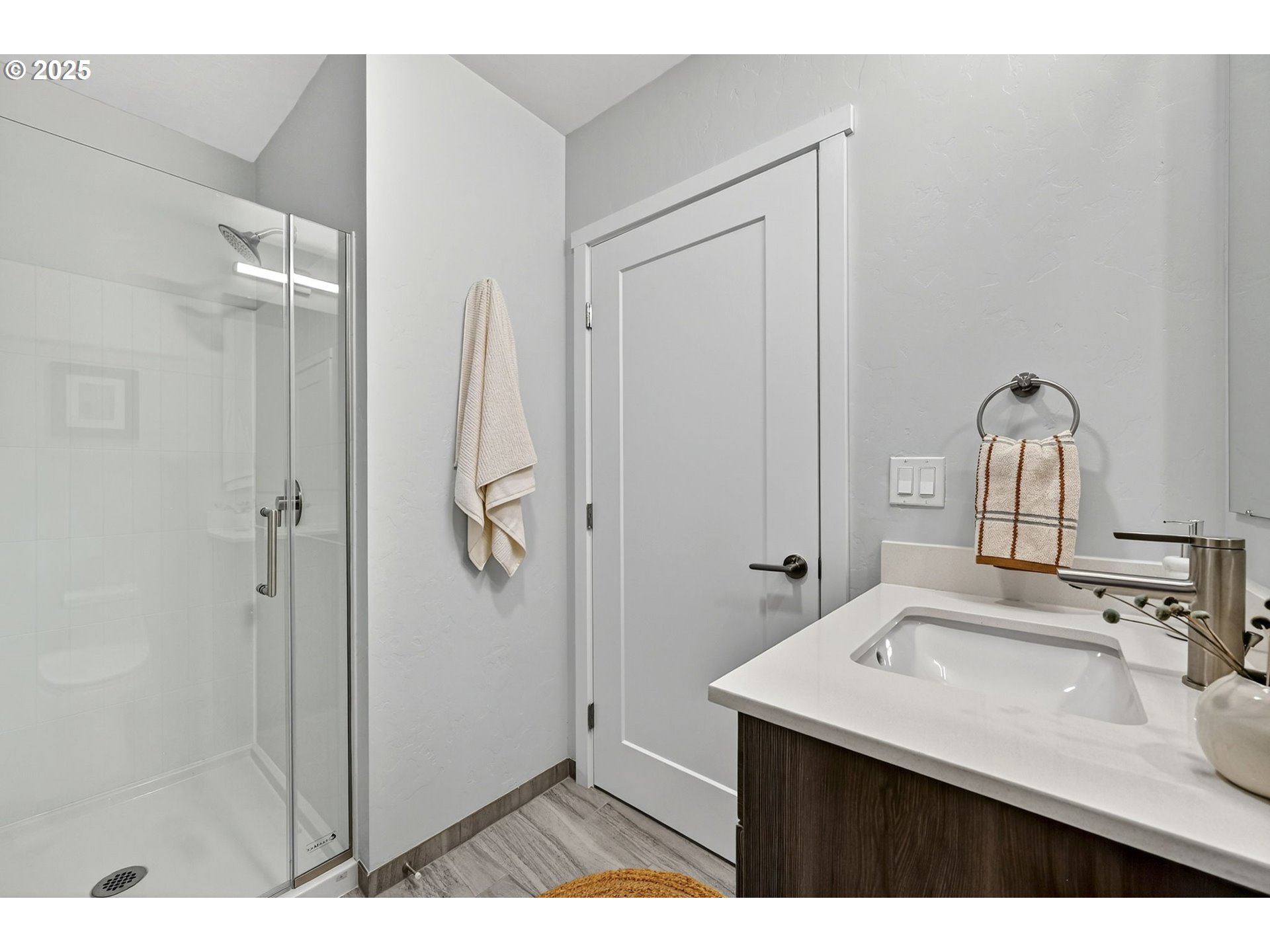 7248 Northeast Going Street Portland, OR 97218 - Photo 17 of 31 a bathroom with a sink and mirror