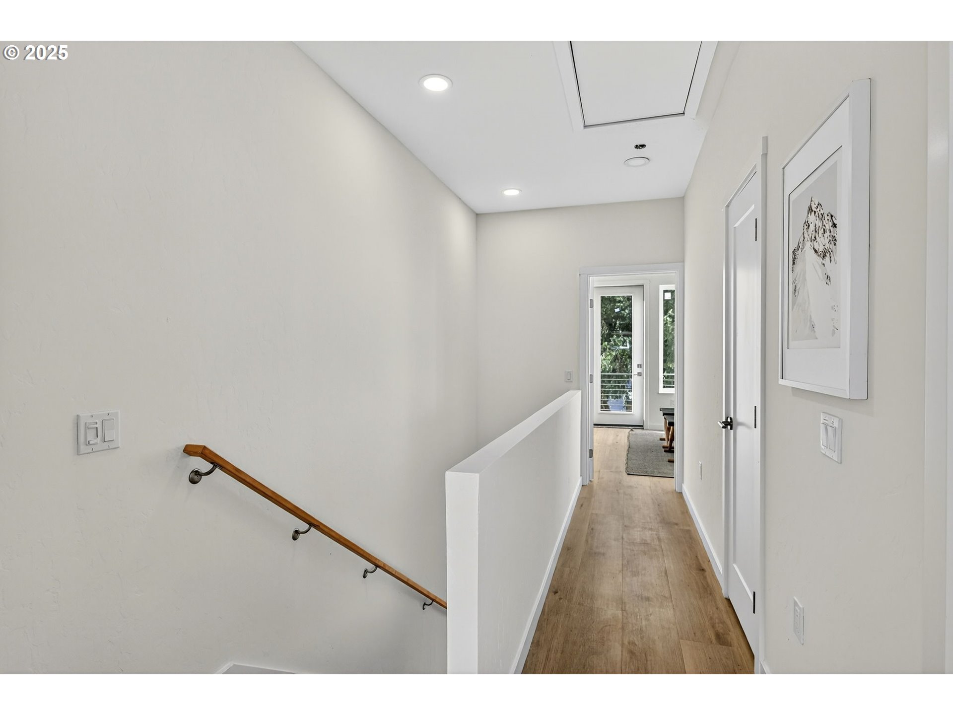 7248 Northeast Going Street Portland, OR 97218 - Photo 18 of 31 a view of a hallway with wooden floor
