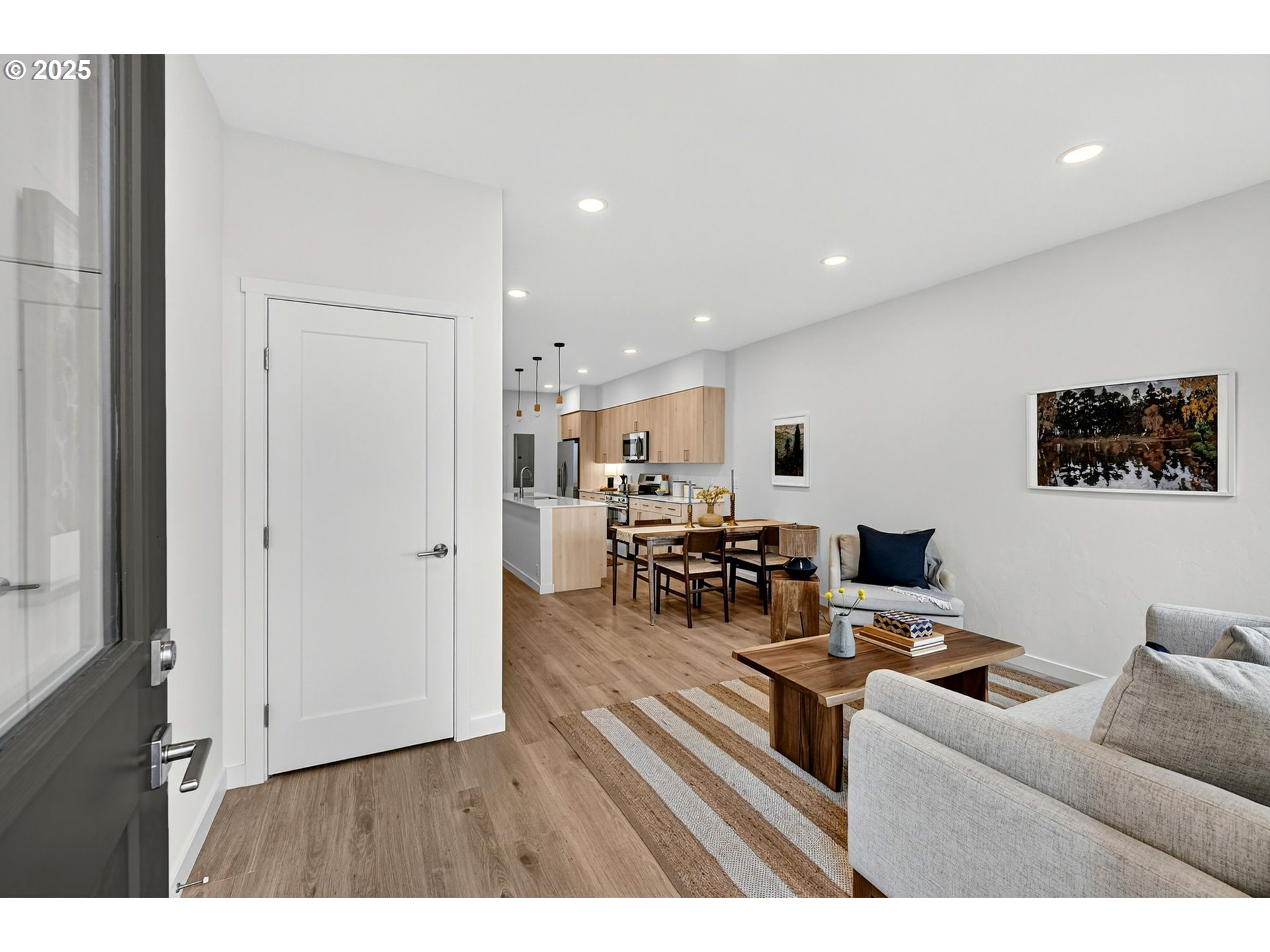 7248 Northeast Going Street Portland, OR 97218 - Photo 2 of 31 a living room with furniture and a flat screen tv