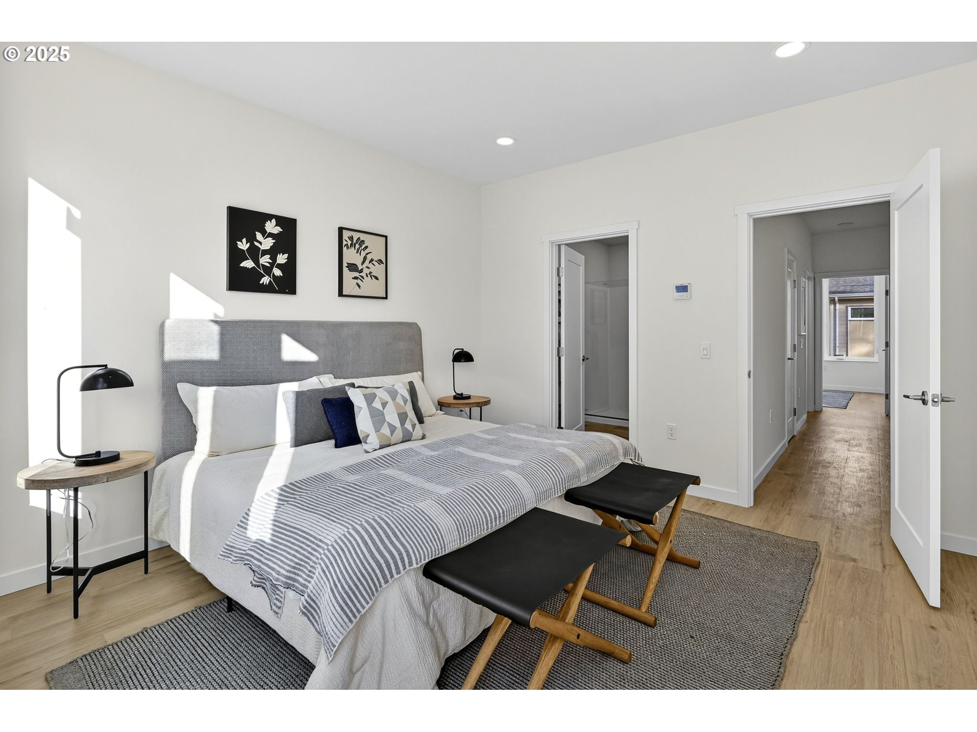 7248 Northeast Going Street Portland, OR 97218 - Photo 21 of 31 a bedroom with a bed and a table