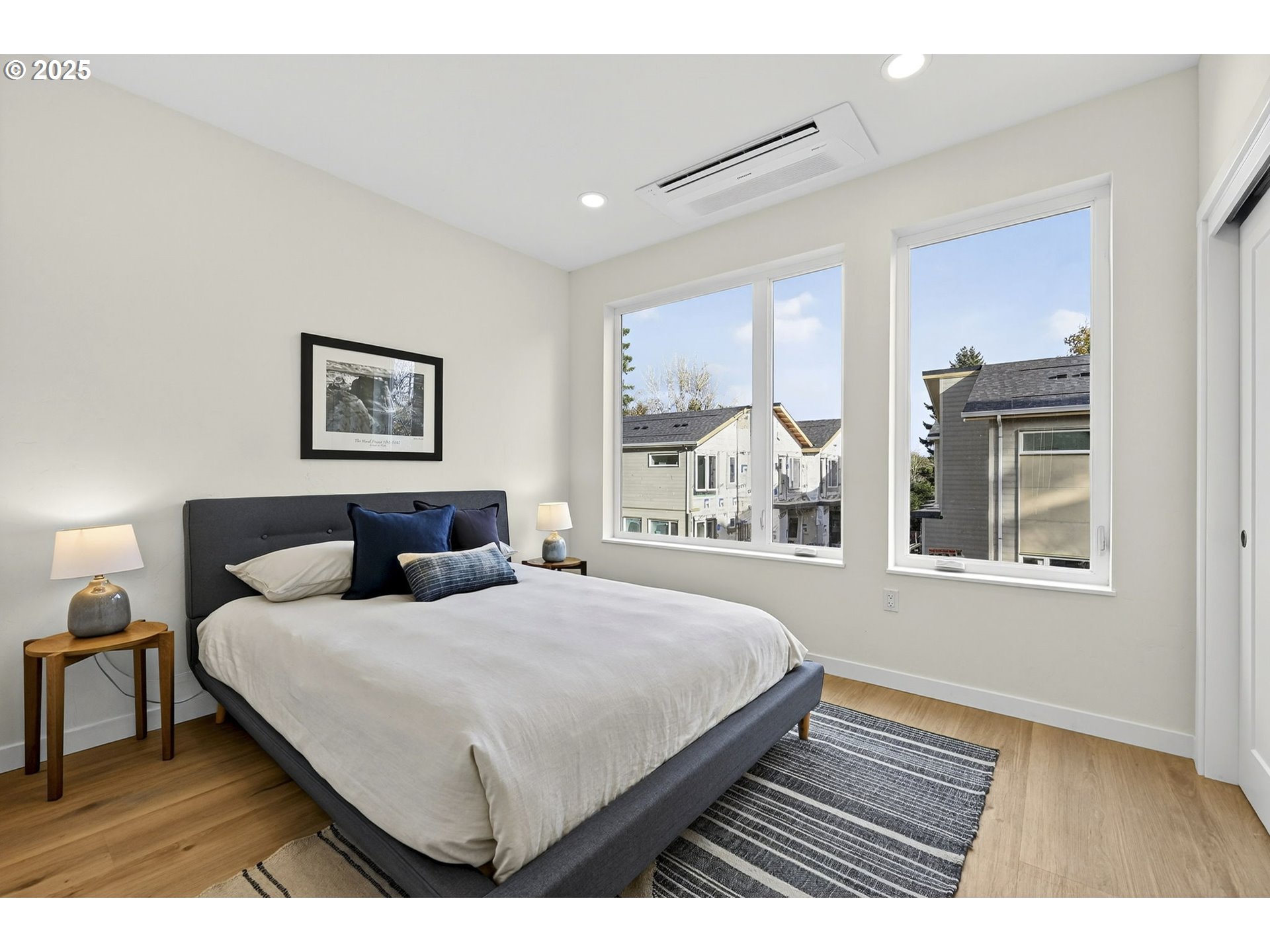 7248 Northeast Going Street Portland, OR 97218 - Photo 26 of 31 a bedroom with bed and a window