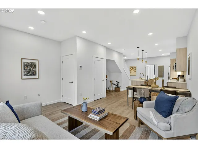 a living room with furniture and a table