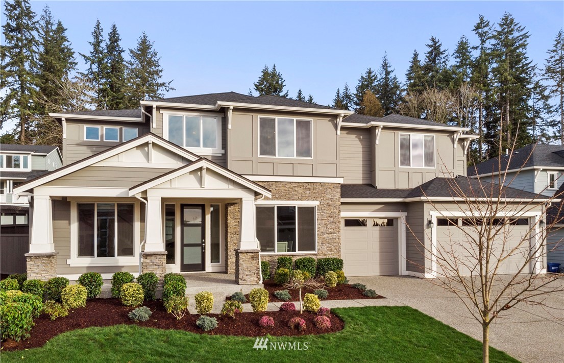 35 242nd Street Southeast Bothell, WA 98021 - Photo 1 of 29 a front view of a house with garden
