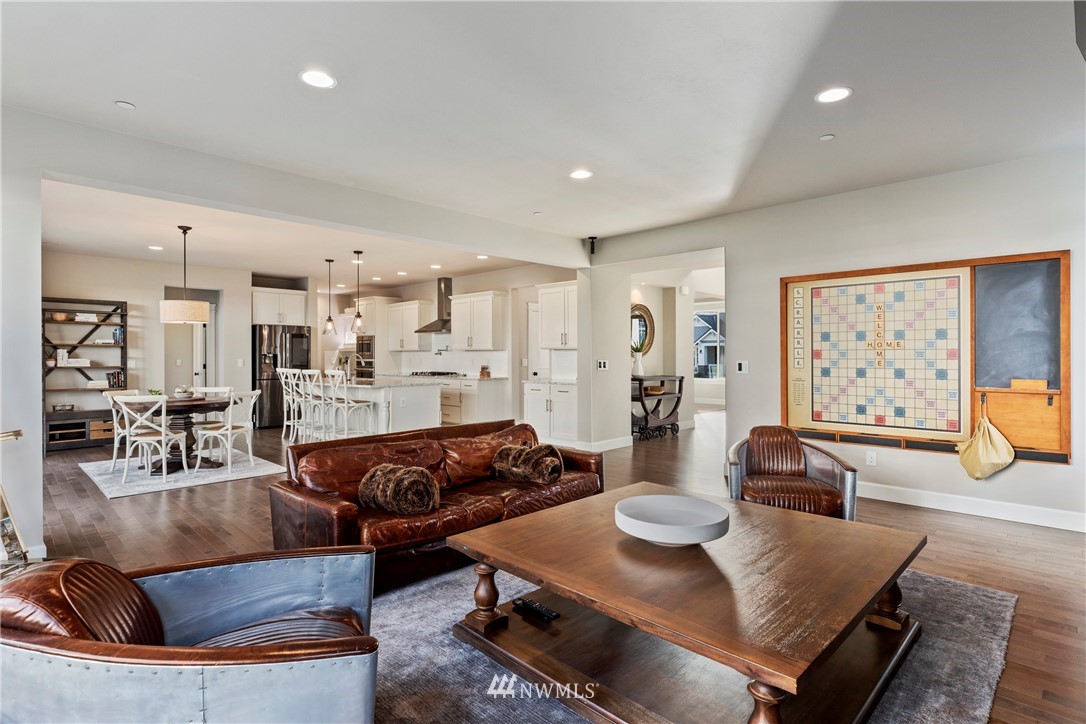 35 242nd Street Southeast Bothell, WA 98021 - Photo 12 of 29 a living room with furniture and wooden floor