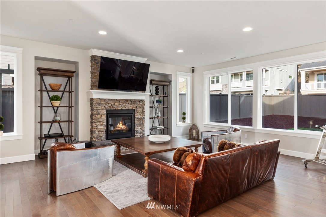 35 242nd Street Southeast Bothell, WA 98021 - Photo 13 of 29 a living room with furniture fireplace and window