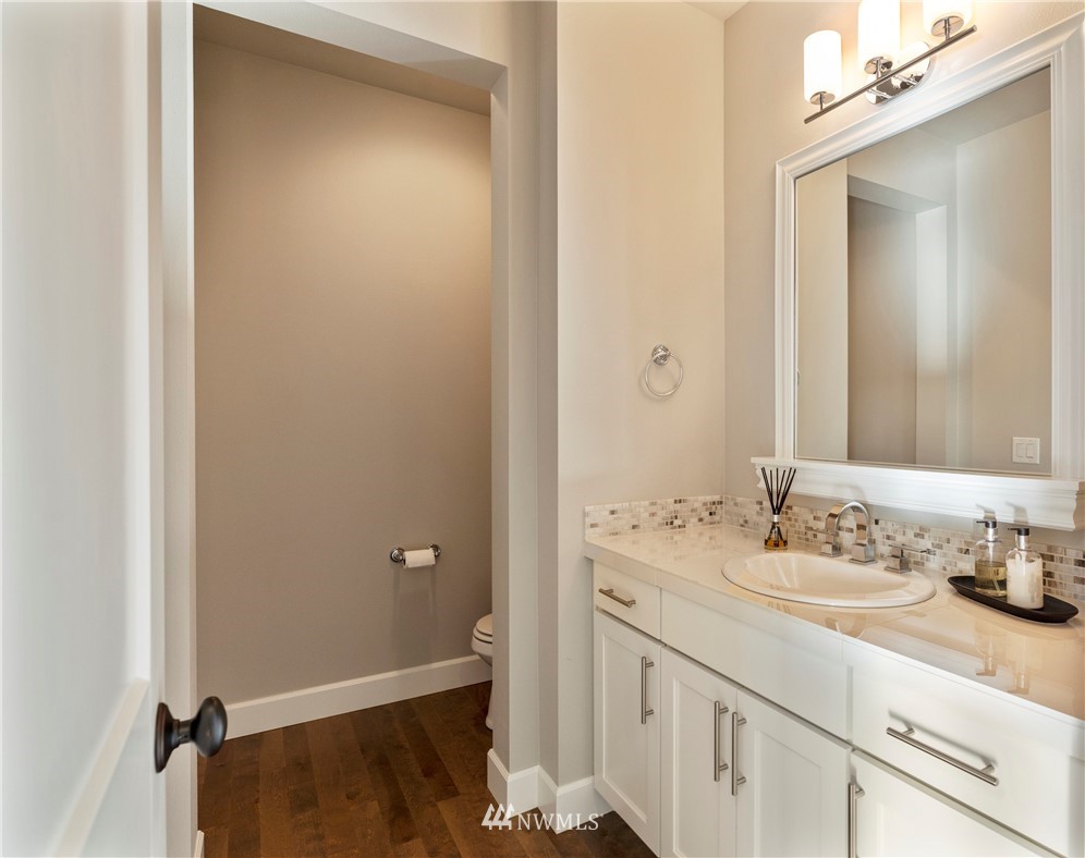 35 242nd Street Southeast Bothell, WA 98021 - Photo 15 of 29 a bathroom with a sink and a mirror
