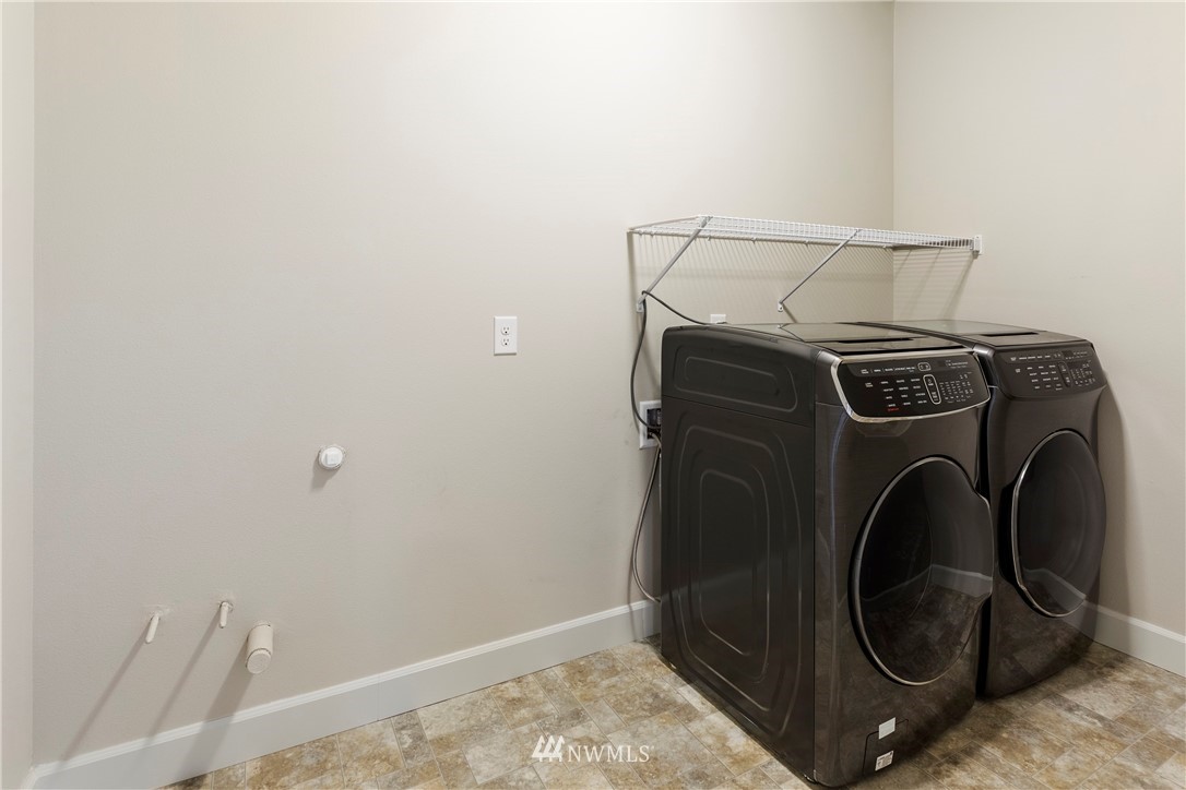 35 242nd Street Southeast Bothell, WA 98021 - Photo 27 of 29 a utility room with dryer and washer