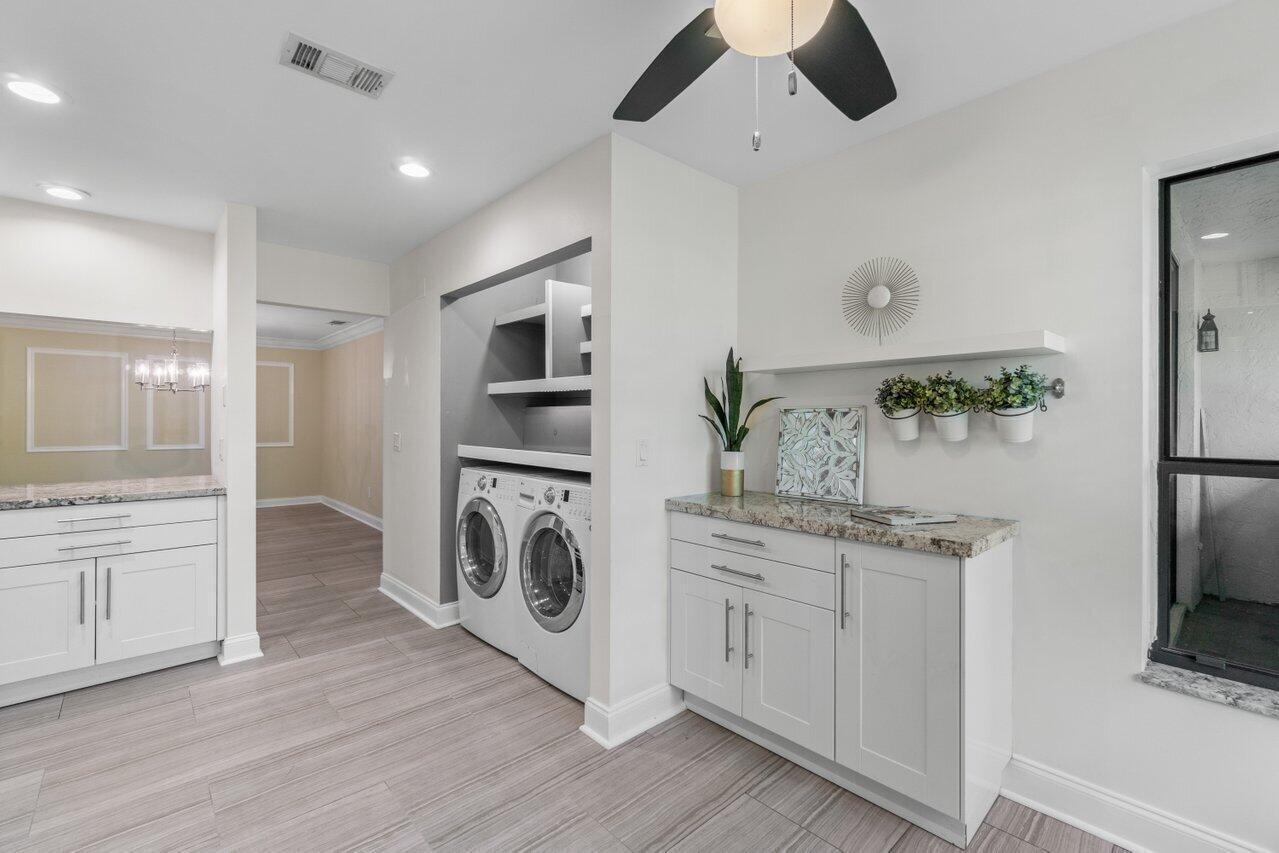 9240 Sabal Ridge Circle, Unit B Boca Raton, FL 33428 - Photo 6 of 22 Extended kitchen storage