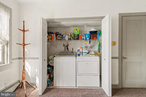 a storage room with a washer and dryer