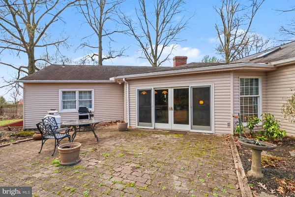 a backyard of a house with seating space