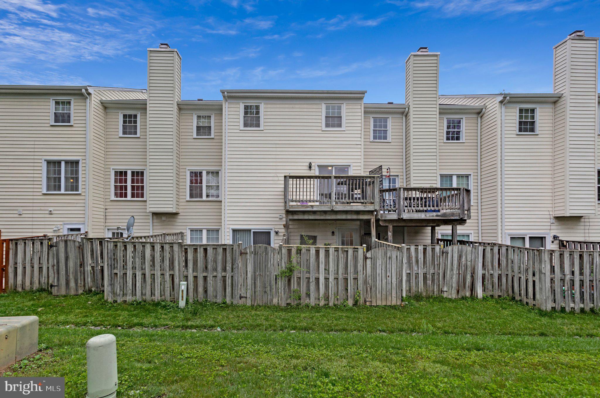 1675 Ridgely Court, Unit 182 Crofton, MD 21114 - Photo 46 of 47 a view of a house with wooden fence