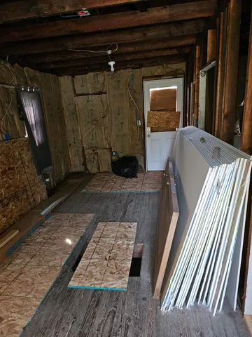 a view of sitting area with furniture and a window