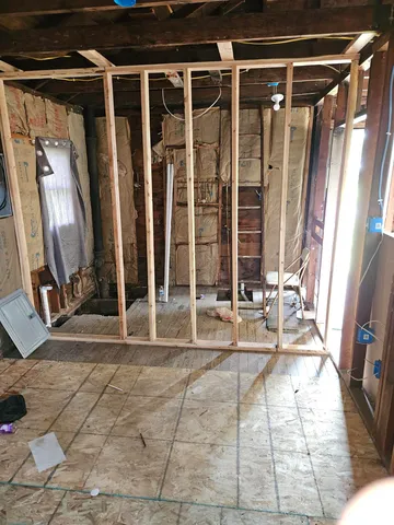 a view of a house with a large window