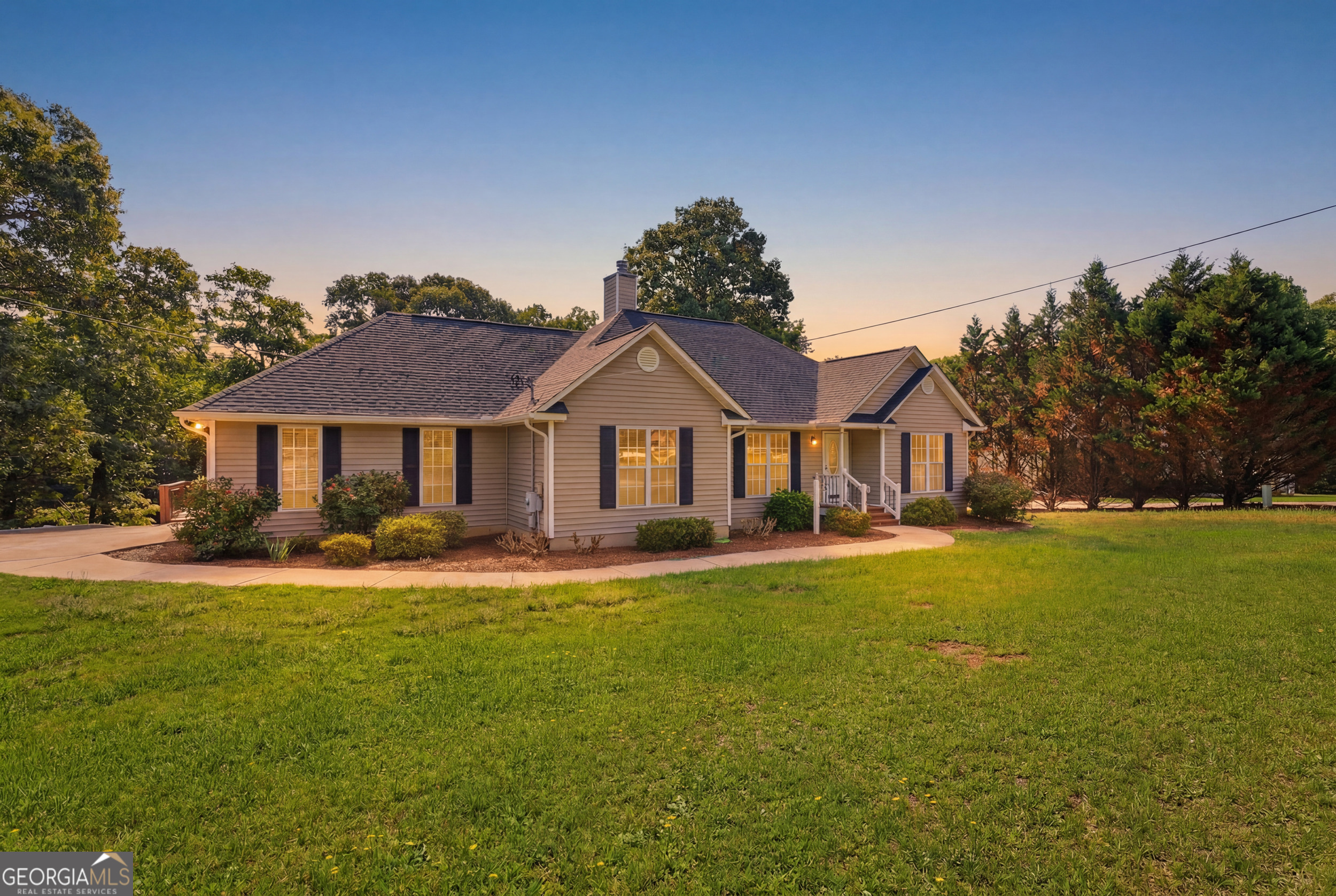 171 Winding Way Hartwell, GA 30643 - Photo 6 of 37 a front view of a house with garden